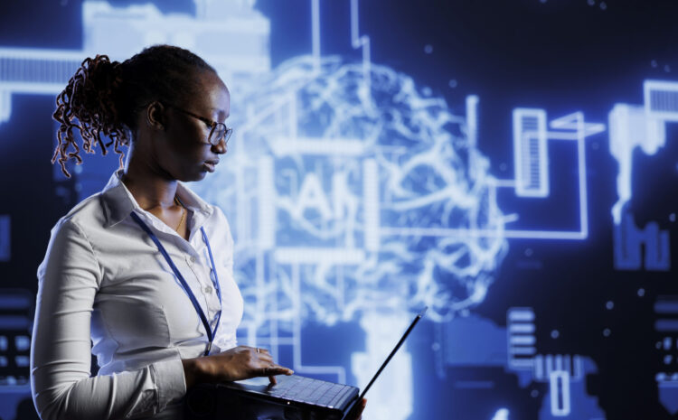 Tech support uses laptop to develop artificial intelligence neural networks nodes modeled after human brain. Data center worker setting up AI machine learning accurately making predictions using data